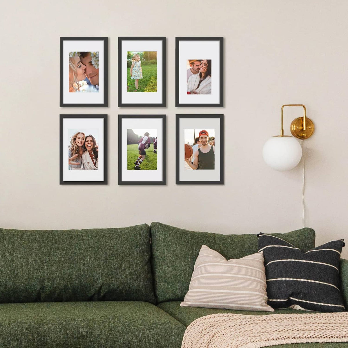Black picture frame set of 5 displaying five photos on a wall
