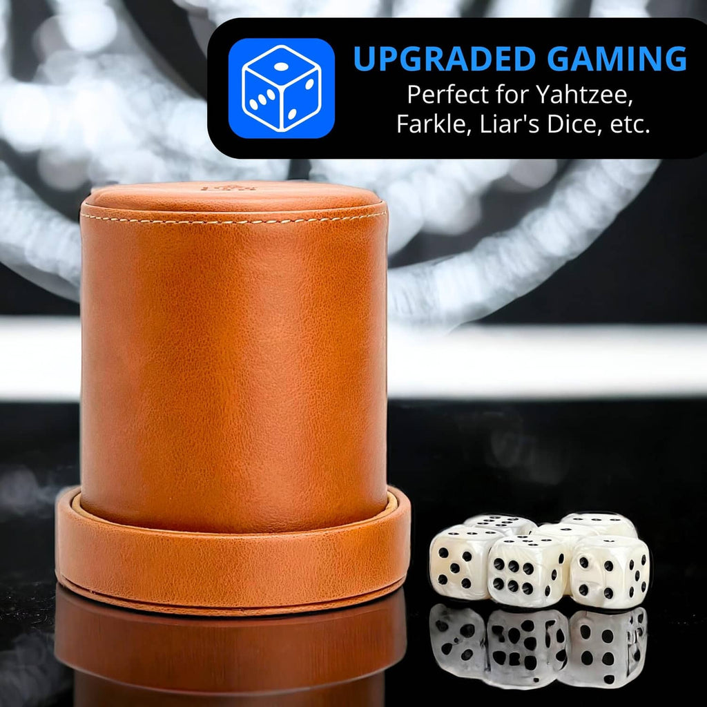 Orange-brown leather dice cup with lid and 6 tan dice beside the cup