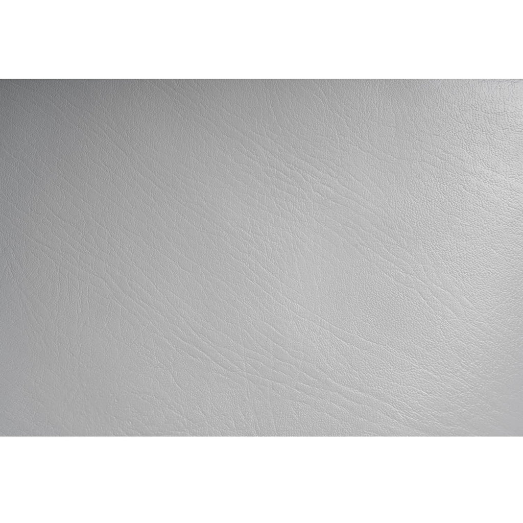 Light gray textured vinyl tractor seat surface close-up