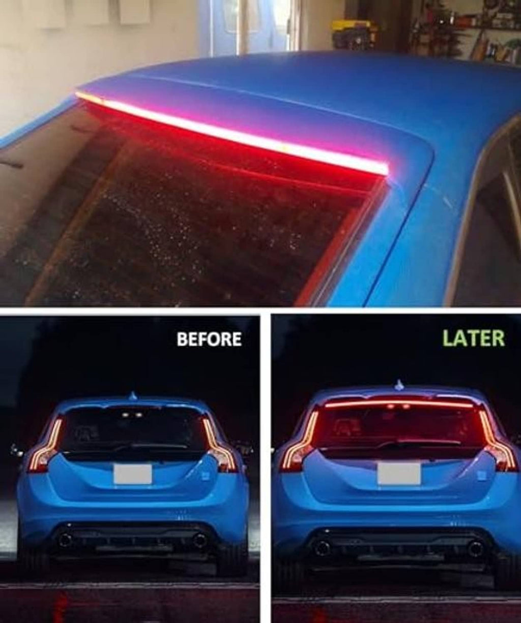 Installed red LED 3rd brake light strip glowing on a car rear