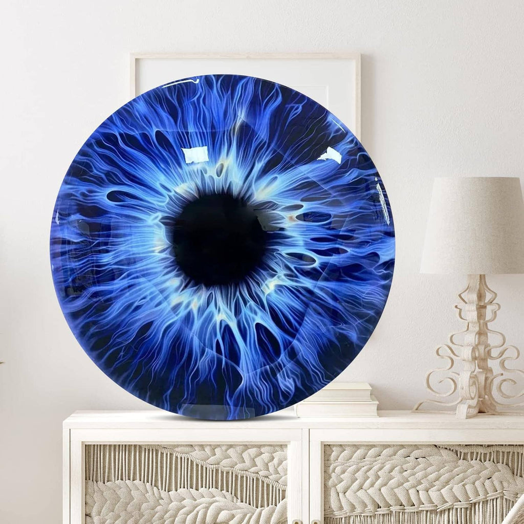 Large round blue epoxy resin artwork with radiant swirl pattern on wall display