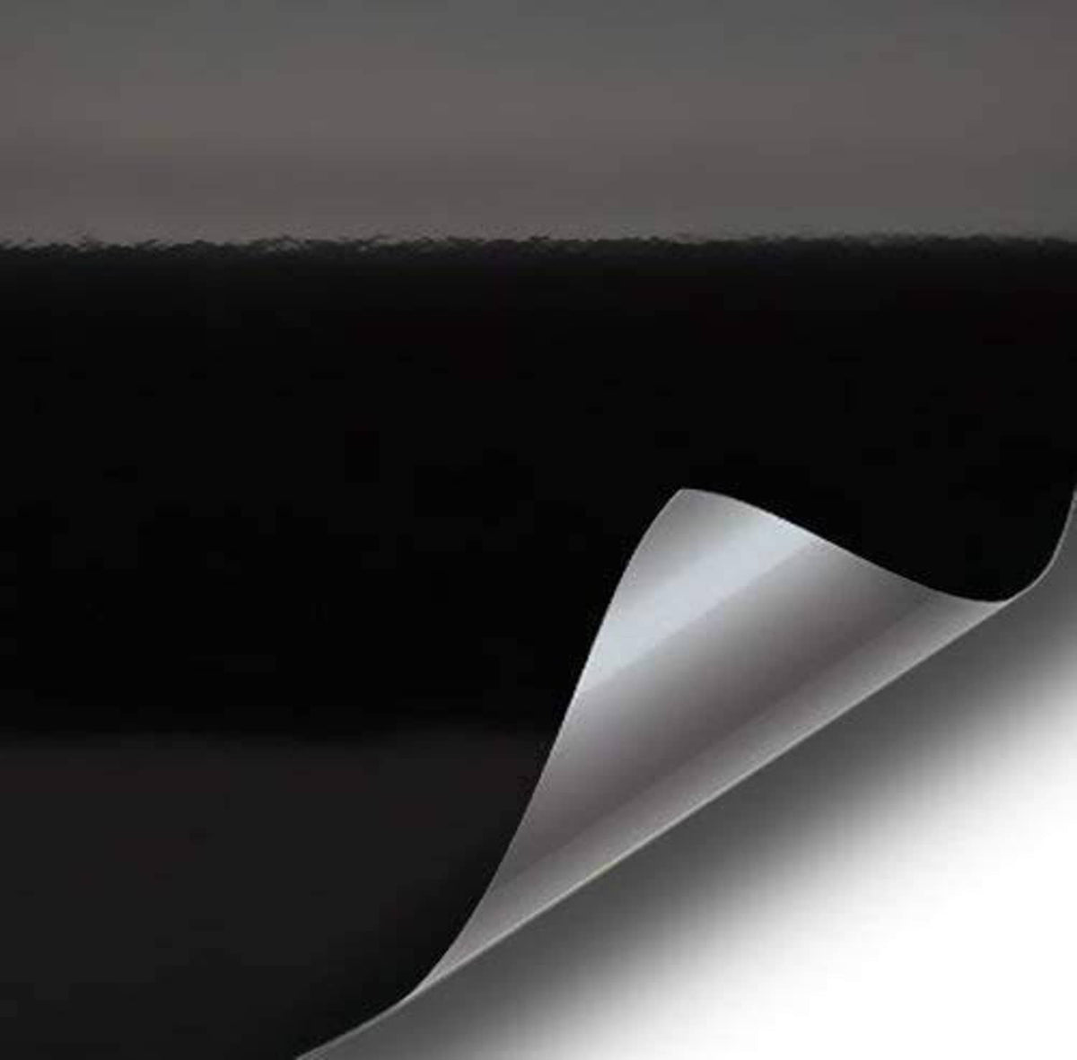 Black high-gloss paint-like vinyl wrap film sheet, realistic microfinish with curled edge