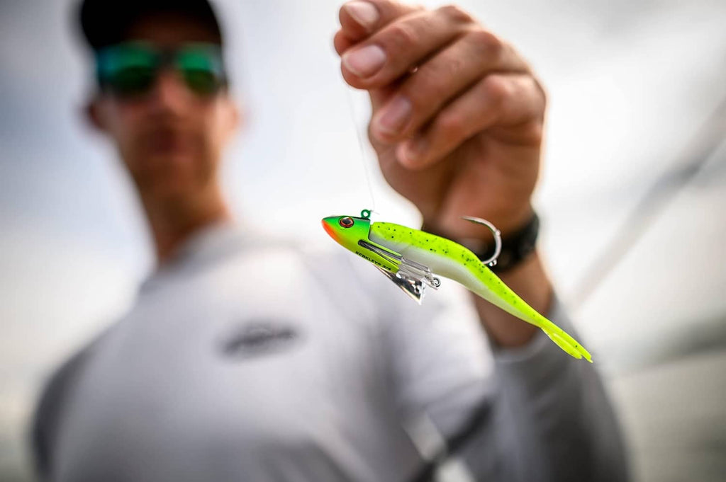 Green chartreuse minnow soft fishing lure with silver hook hardware