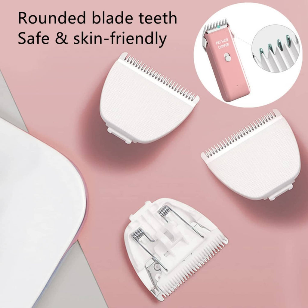 Rounded teeth pet clipper blade heads, shown on white and pink housings