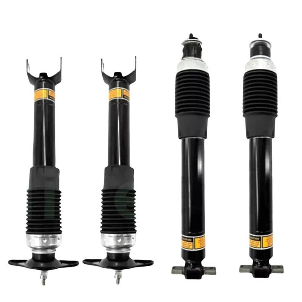 Magnetic shock absorbers set, four black shock units with ribbed sections and silver bases