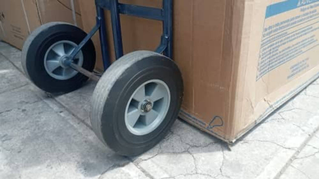 Hand truck wheel set with solid rubber tires, light gray rims, metal hubs