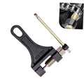 Chain breaker tool with black handle and long steel driving pin