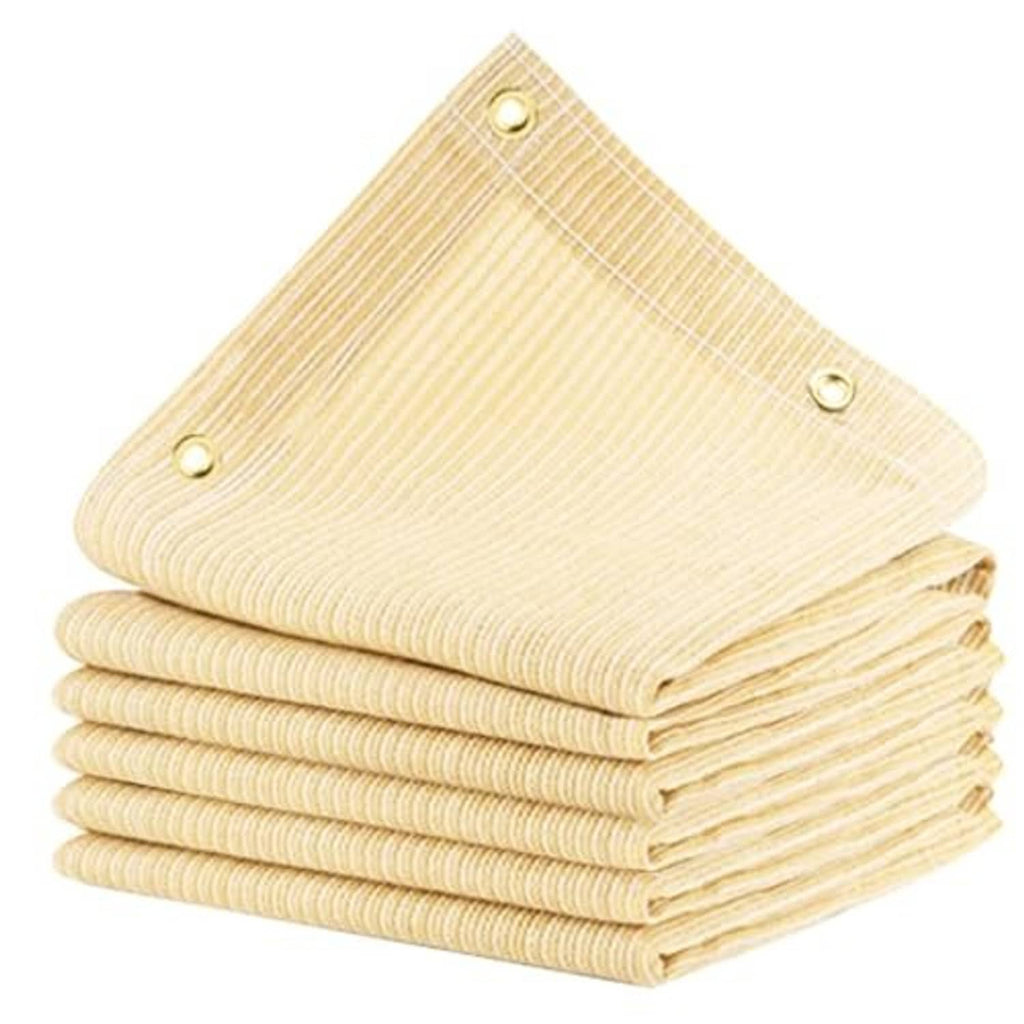 Beige sun shade cloth roll stack with metal grommets along reinforced border