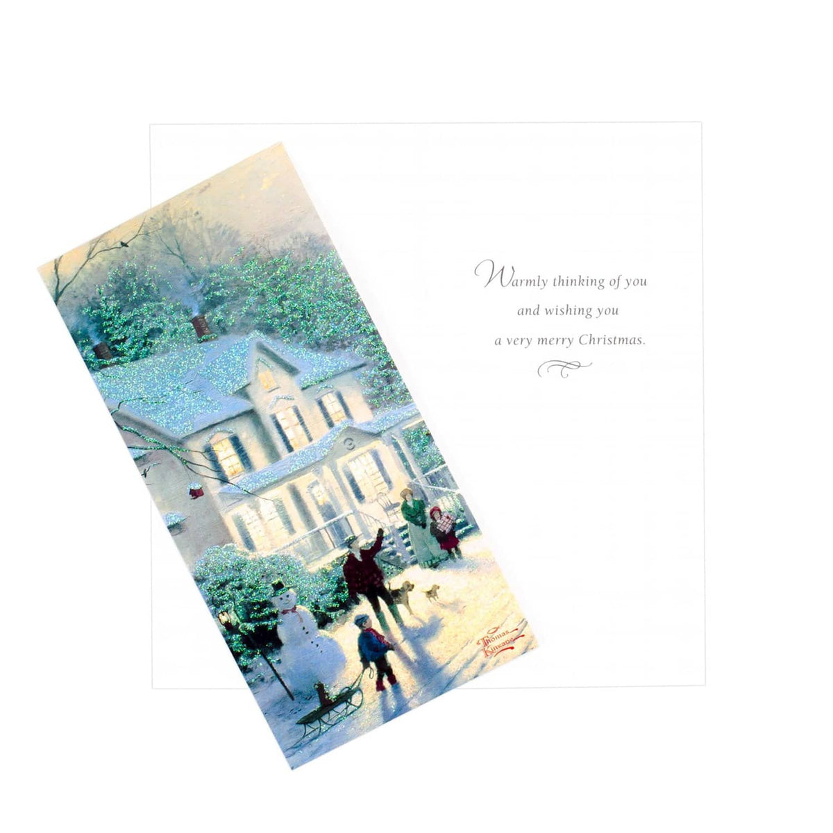 Christmas greeting card with snowy house illustration and printed merry Christmas message