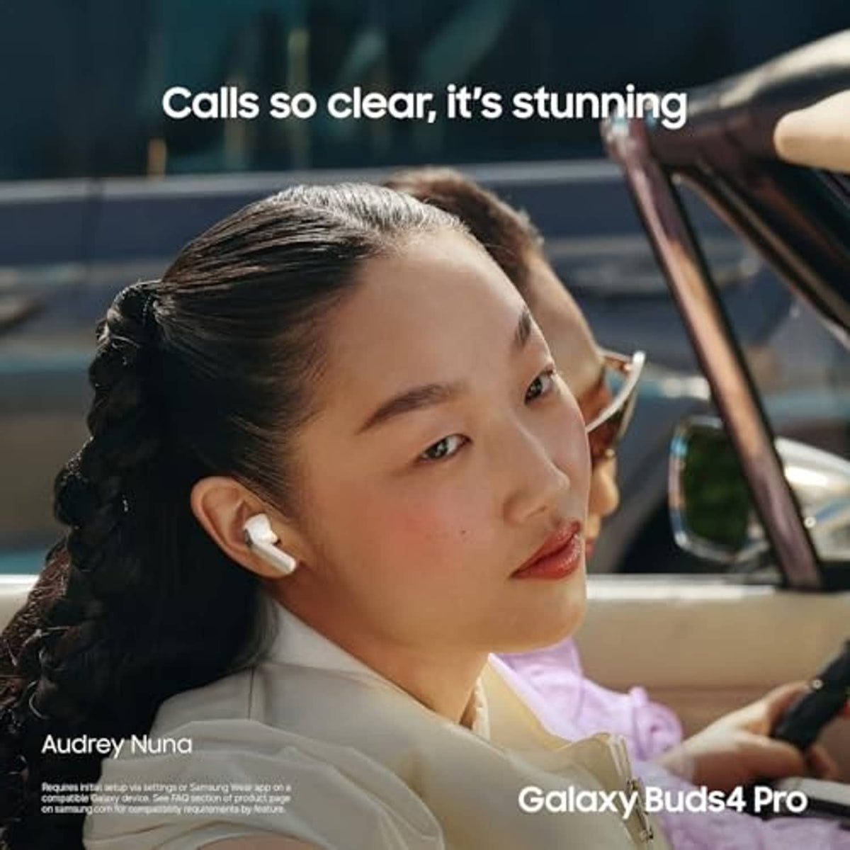 White true wireless earbuds in-ear on a person, clear call-ready style