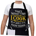 Black cross-back grilling apron with large pocket and 'I Cook' chest print