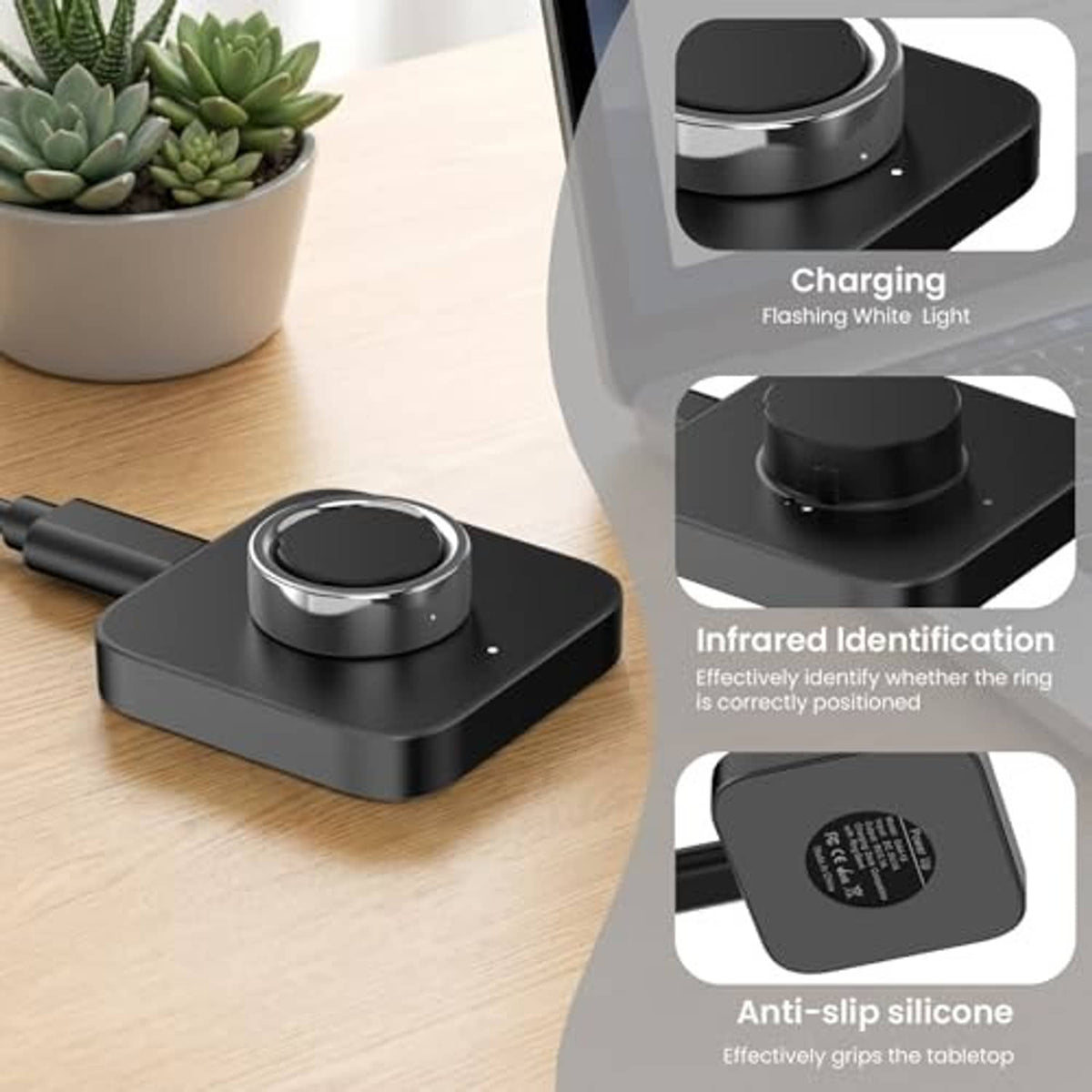 Black Oura Ring Gen4 charging dock on tabletop with anti-slip silicone base
