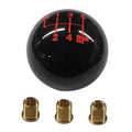 Black 6-speed shift knob with red shift numbers and three brass threaded inserts