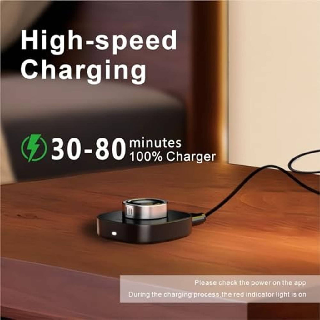 Black charging dock on tabletop with USB-C cable connected for charging