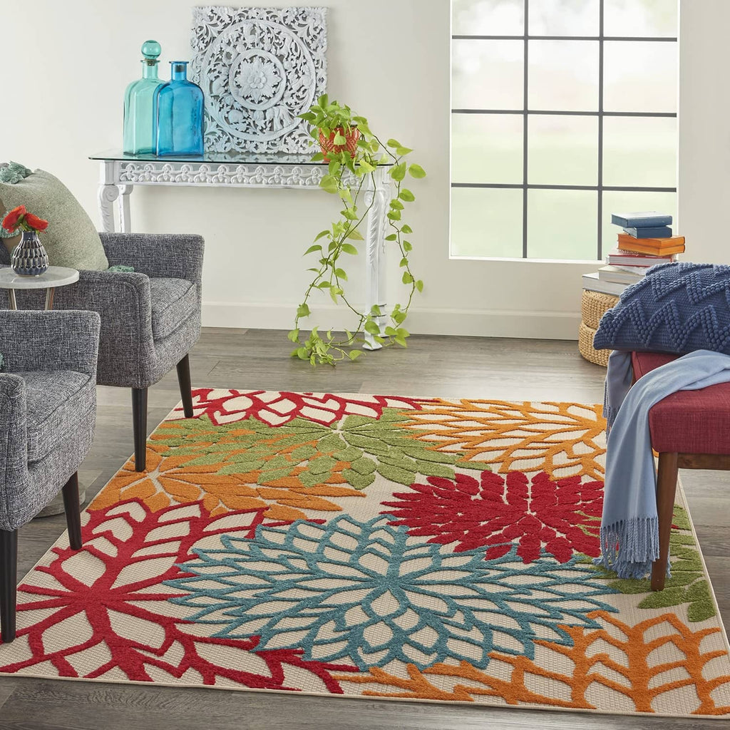 Tropical area rug with multicolor floral border and center medallion in red and teal