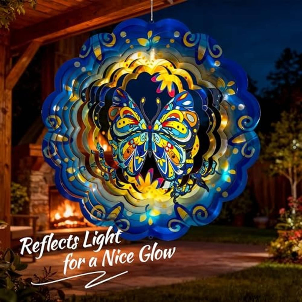 Blue butterfly wind spinner glowing with reflective rings and a bright multicolor center