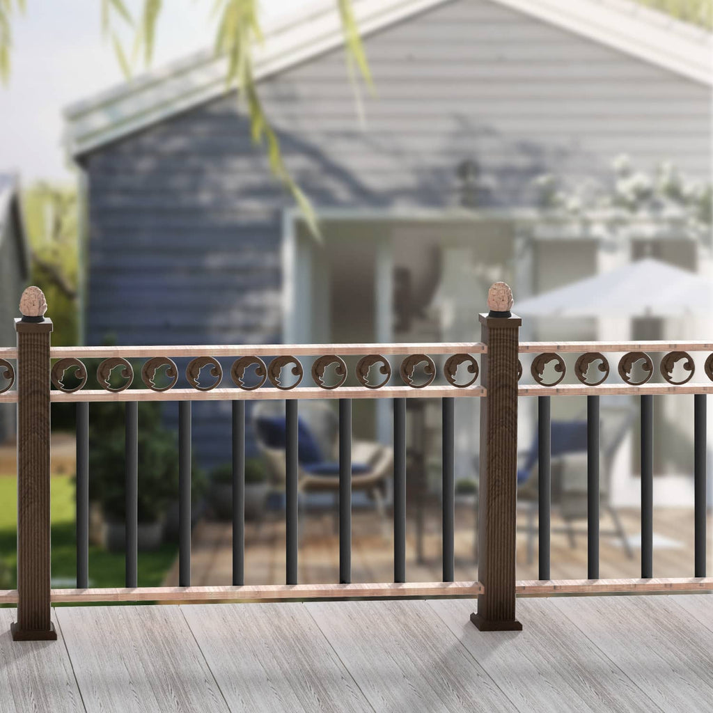Matte black baluster spindles along deck railing with decorative circular top insert