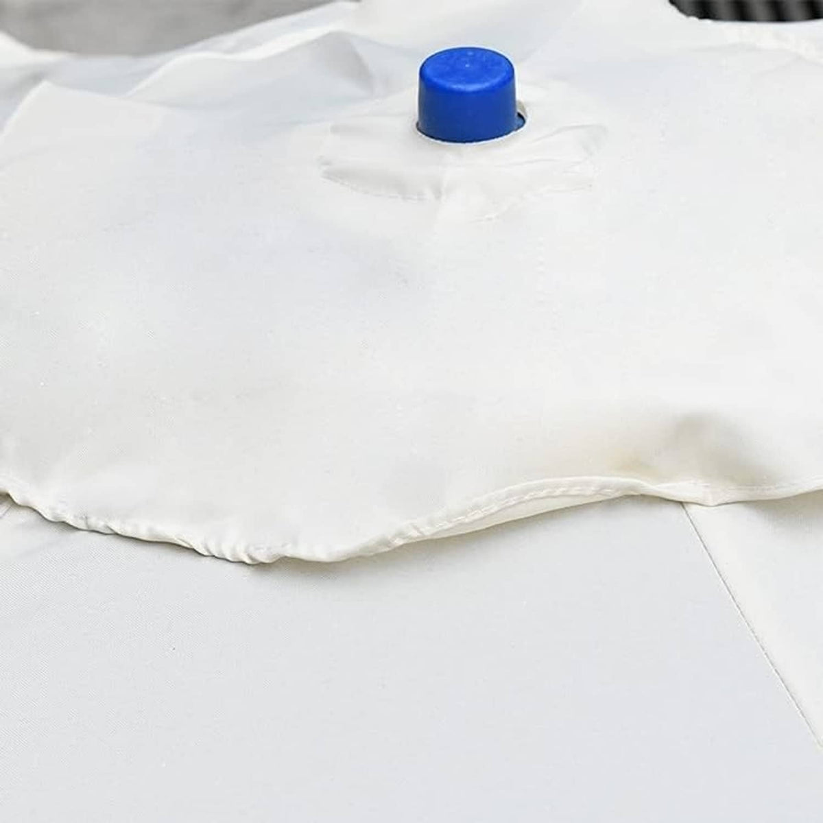 Cream canopy hem with stitched edge and corner seam detail