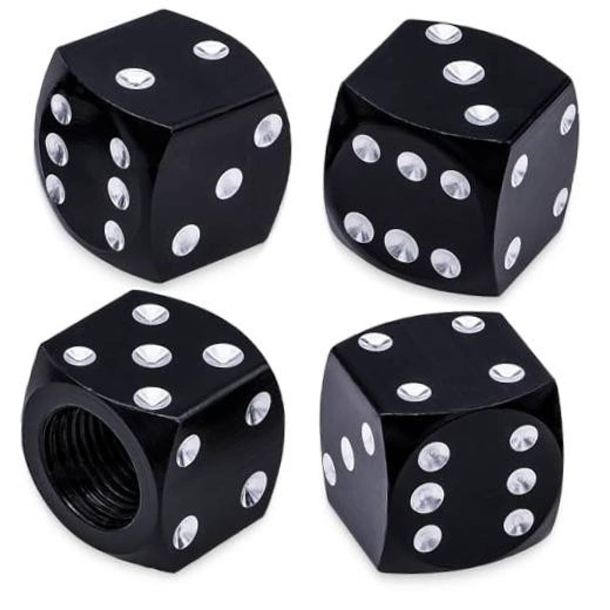 Four black dice-style tire valve stem caps with silver dots, angled view set