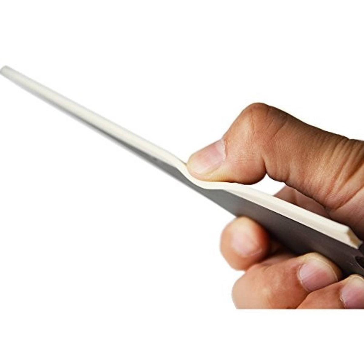 Hand holding corner squeegee tool with long white edge