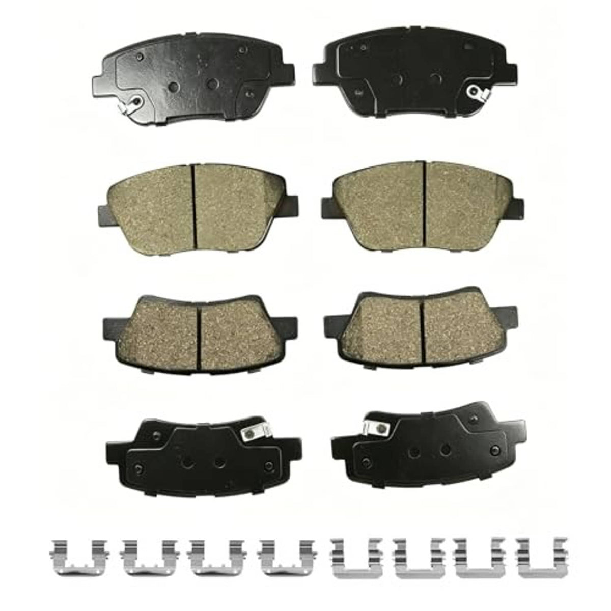 Assorted front and rear ceramic brake pads with hardware, tan pads and black backing plates