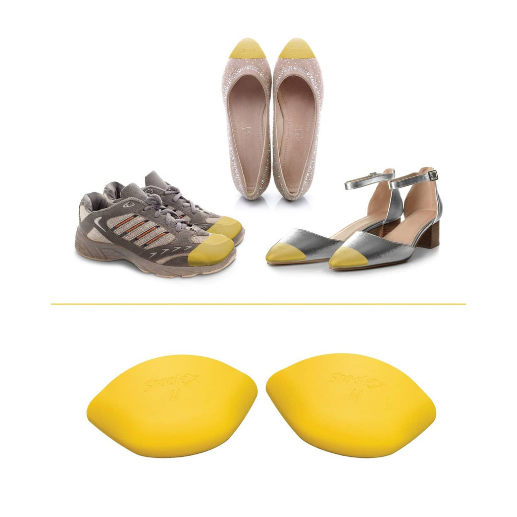 Shoe filler inserts set with yellow M pads, shown with shoes for fit