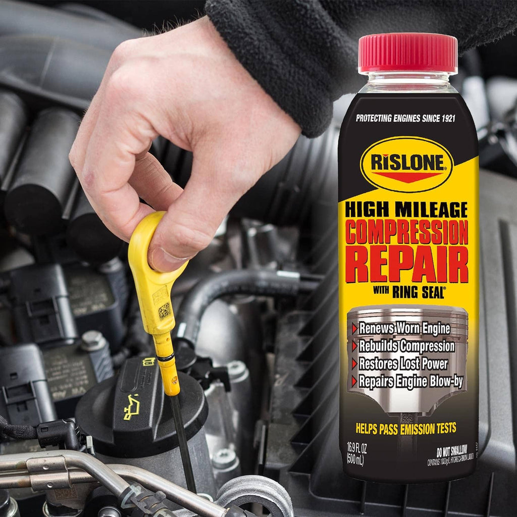 Rislone high mileage compression repair bottle with ring seal, held near engine