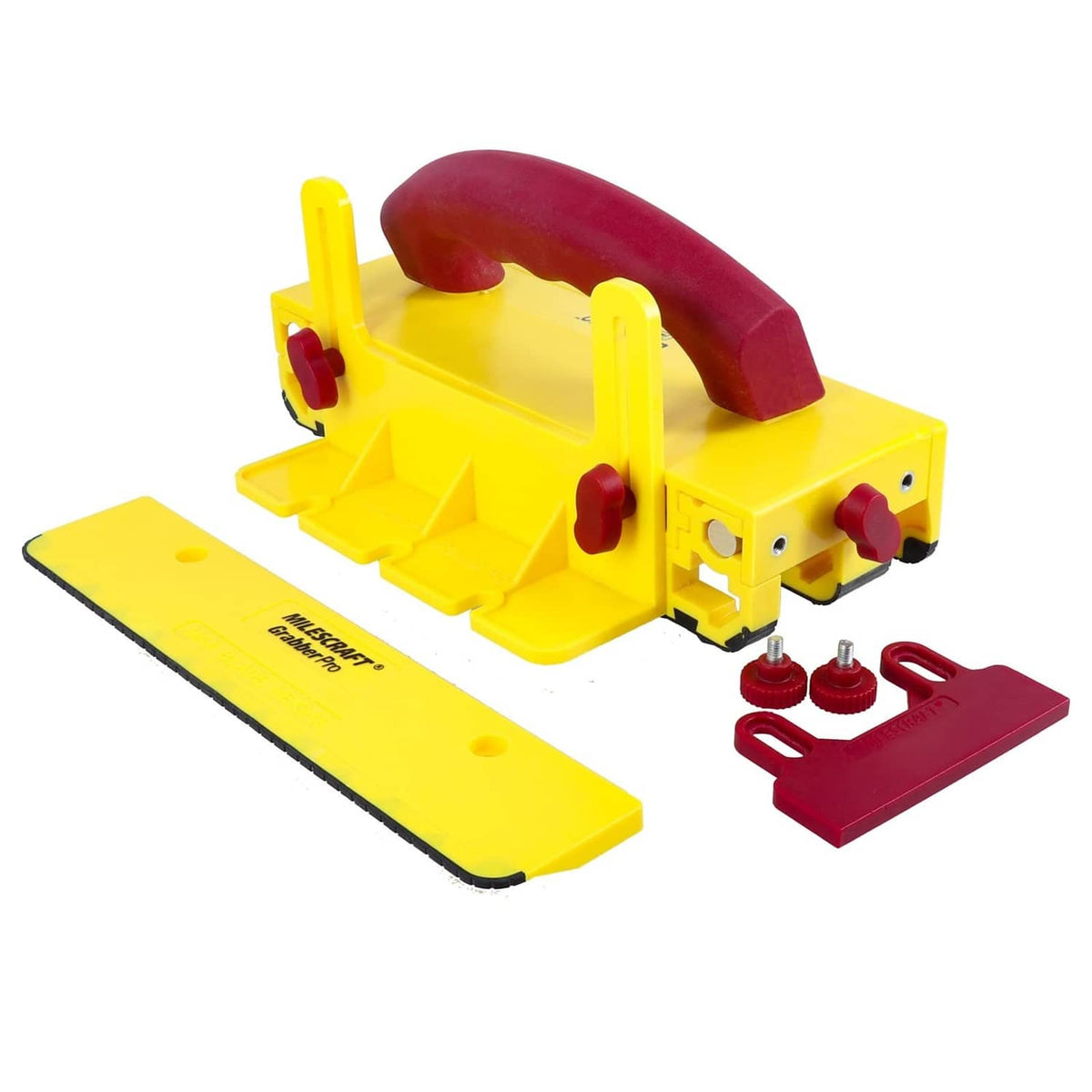 Yellow push block with maroon handle, base plate, and red guide insert pieces