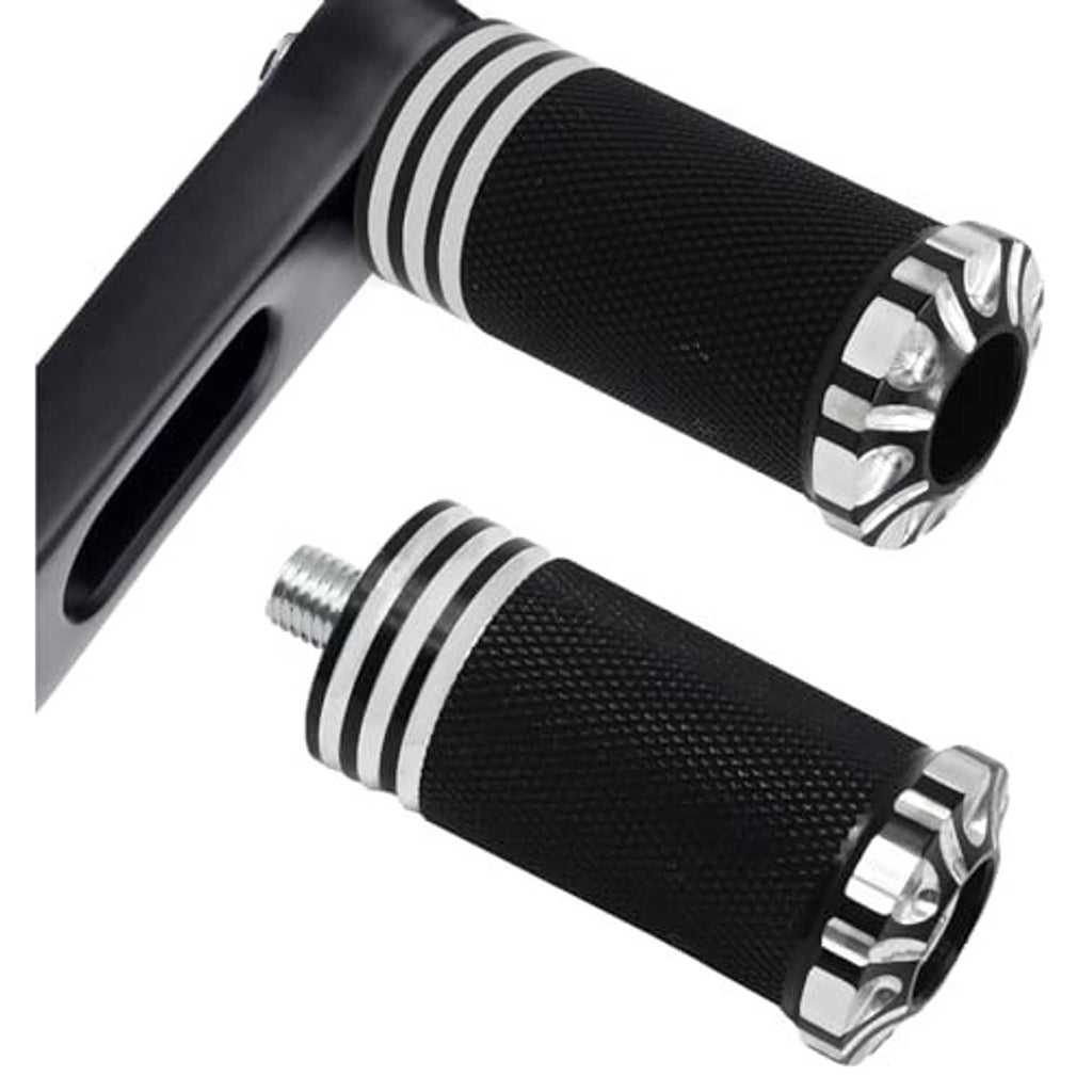 Black textured shifter pegs with silver rings mounted on a gray shift lever arm