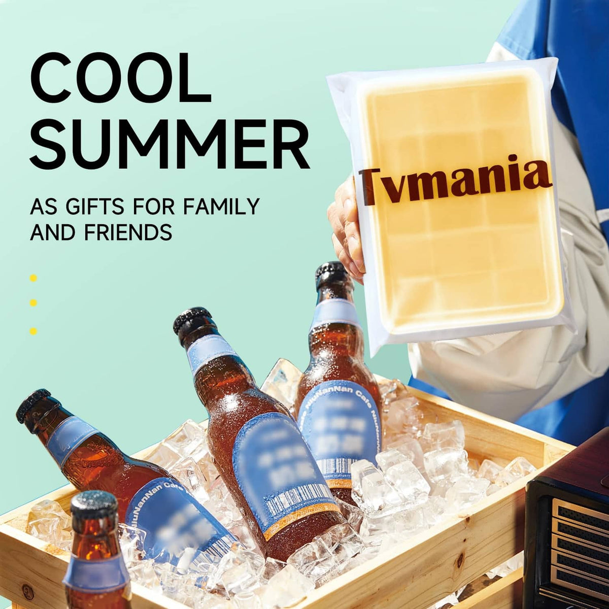 Tvmania yellow ice cube tray with lid held in hand, ready to freeze