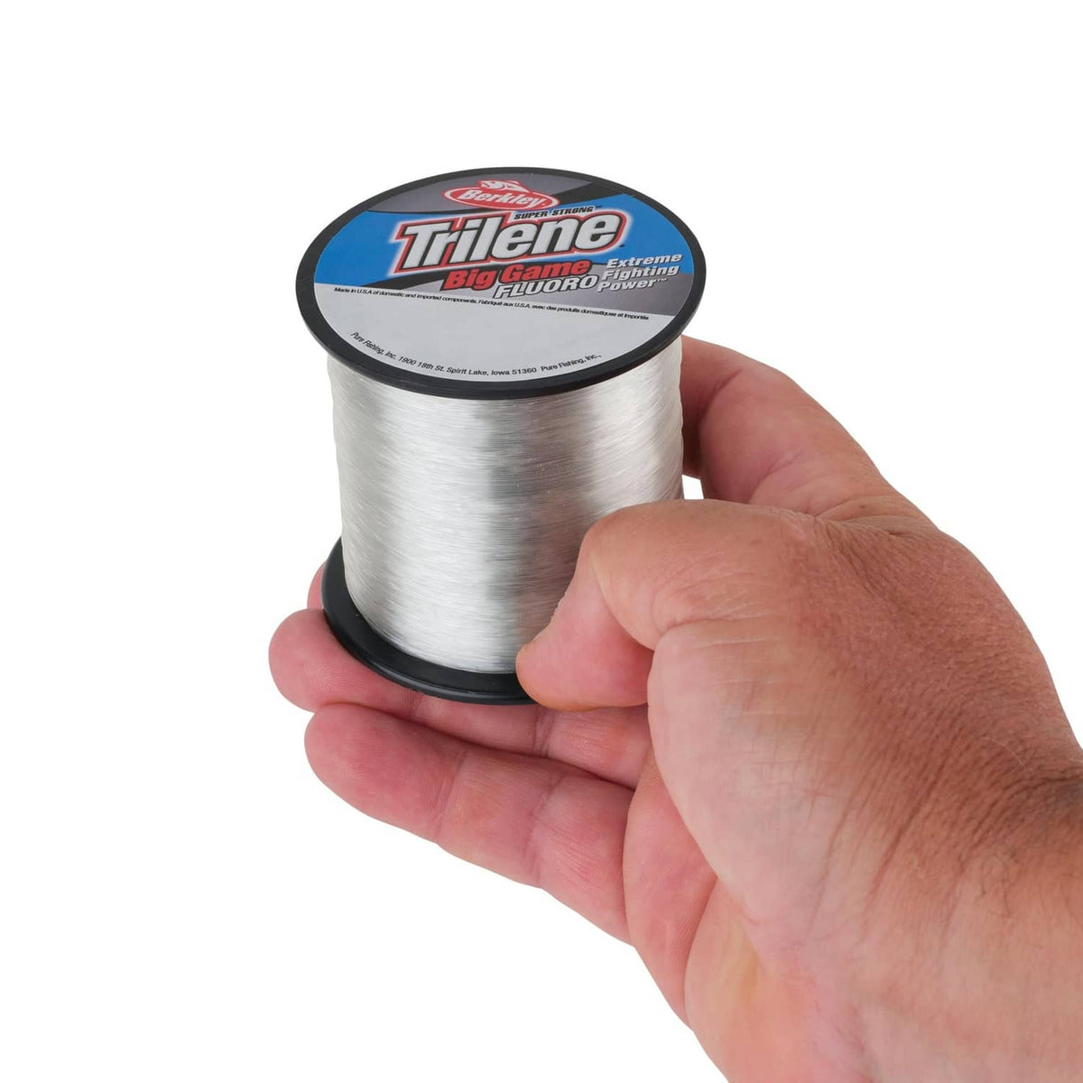 Fishing line spool held in hand, white line on black reel with Trilene label