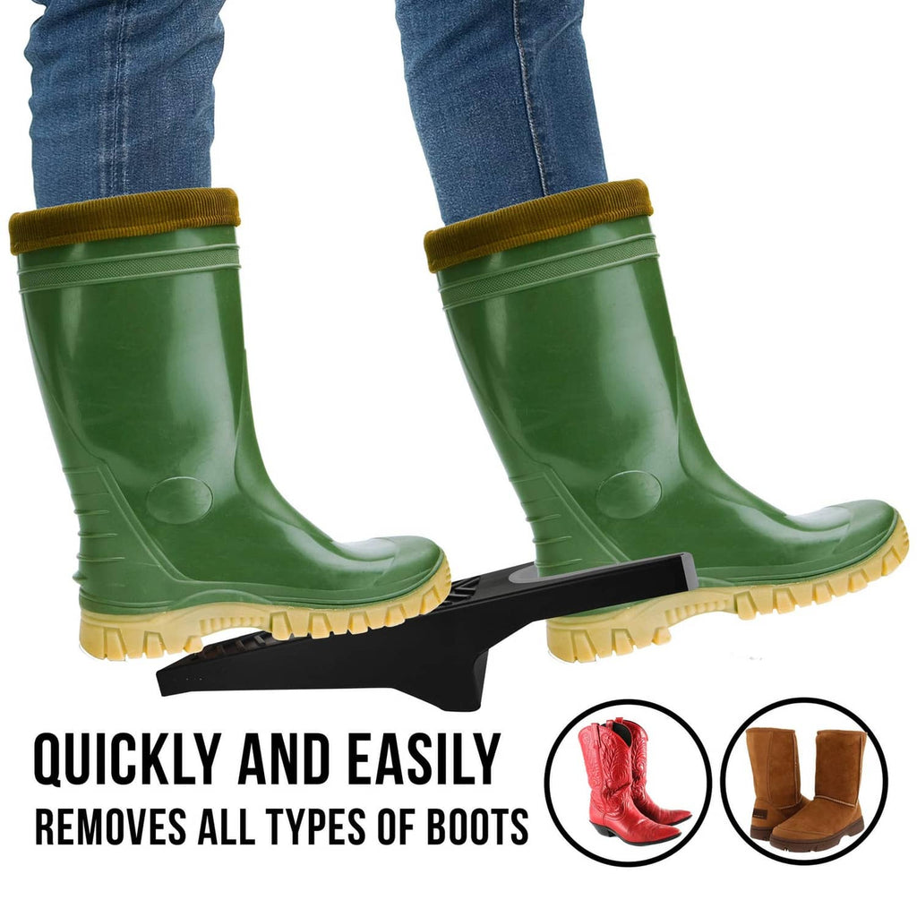 Black boot puller tool lifting green rubber boots with textured grip base