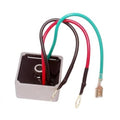 Voltage regulator rectifier with teal, red, and black wires and mounting block