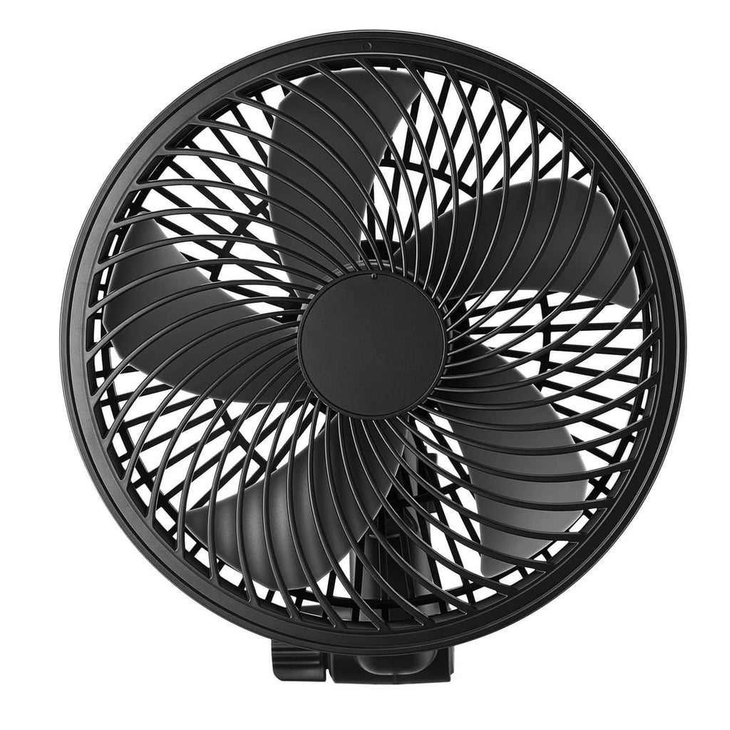 Close-up of black clip-on fan front grille with circular center disc