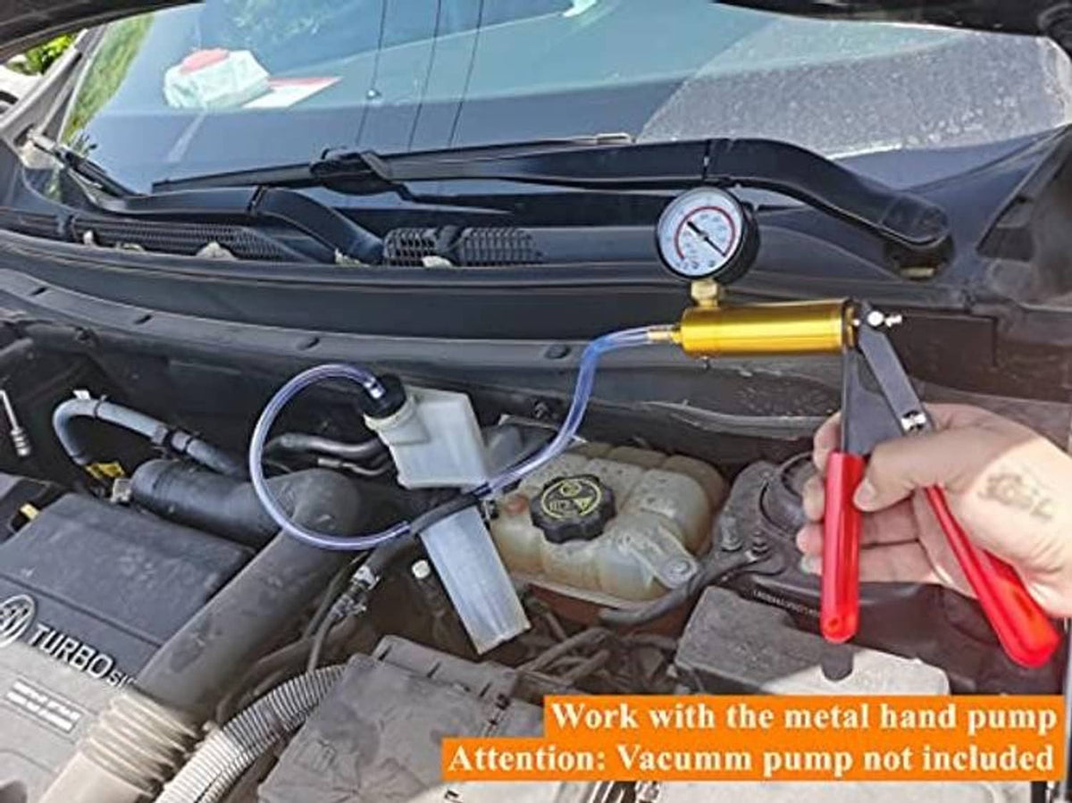 Brake bleeding adapter kit with clear hose connected to engine reservoir and hand pump