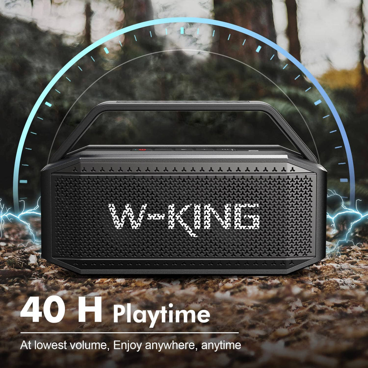 Black portable Bluetooth speaker outdoors with front grille and carry handle