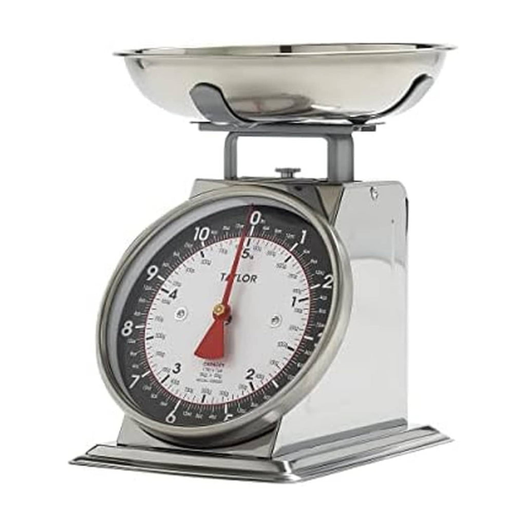 Black and silver mechanical kitchen food scale with round bowl and analog dial