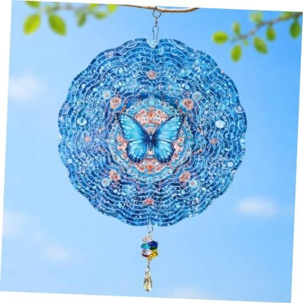 Blue 3D butterfly wind spinner with circular filigree and rainbow crystal pendant