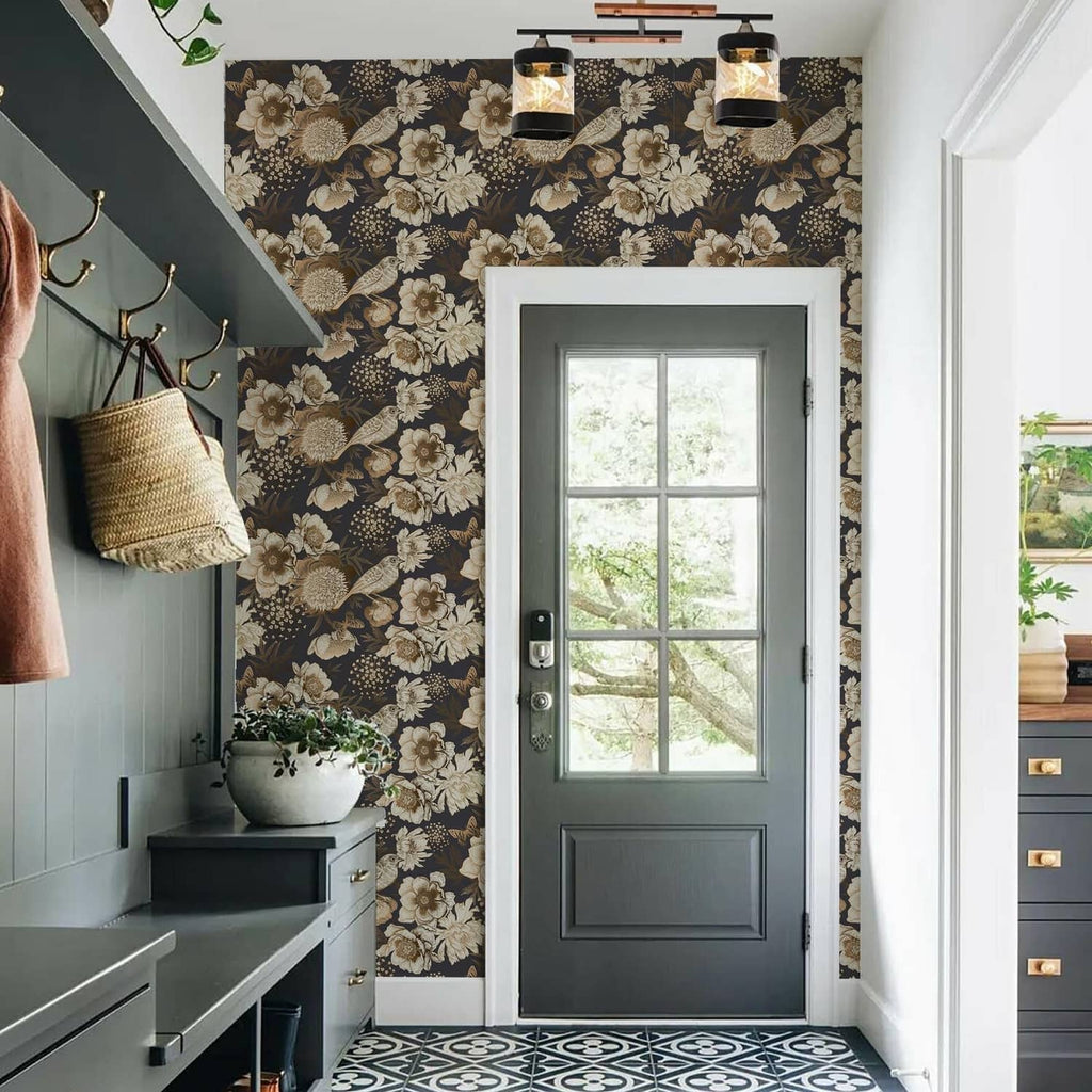 Black and gold botanical wallpaper with birds and flowers covering interior wall