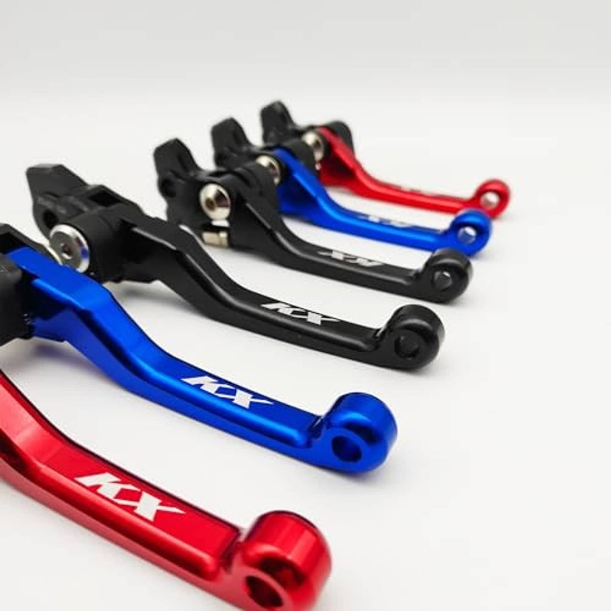 Close-up brake and clutch levers in red and blue with black pivot mounts