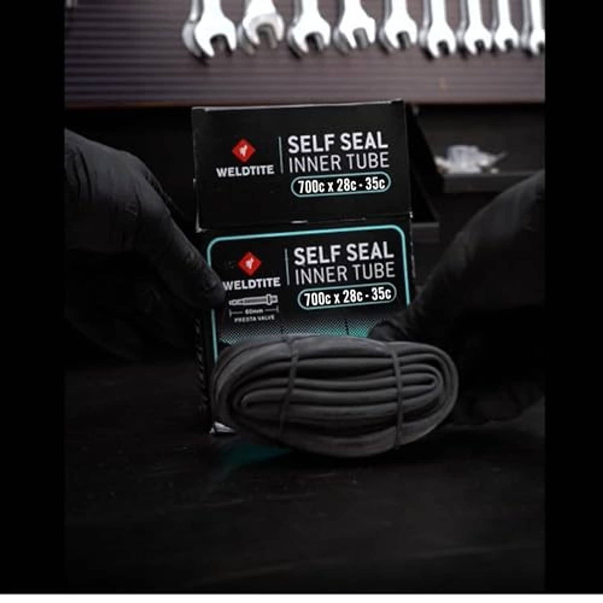 WELDTITE self-seal inner tube package with coiled dark inner tube