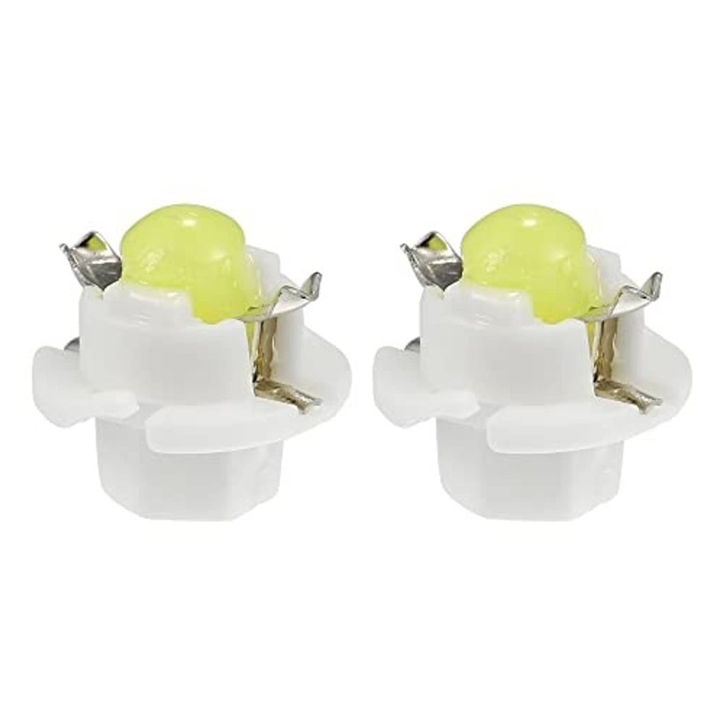 Pair of T5 LED dashboard bulbs with white bases and lime-green LED chips