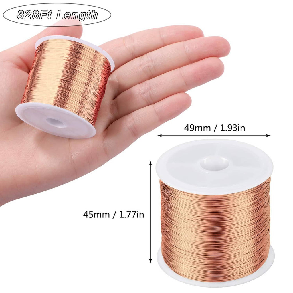 Rose gold jewelry wire spool held in hand, thin wire coiled on white reel