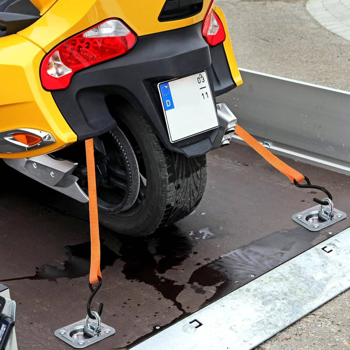 Recessed D-ring anchor installed at a trailer hitch platform with mounting base plate