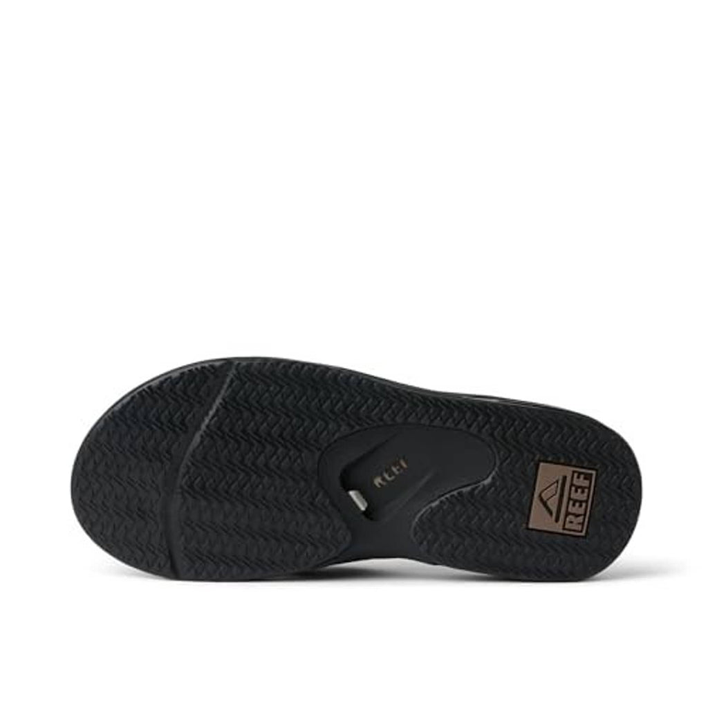 Black rubber outsole for flip flops with textured tread pattern
