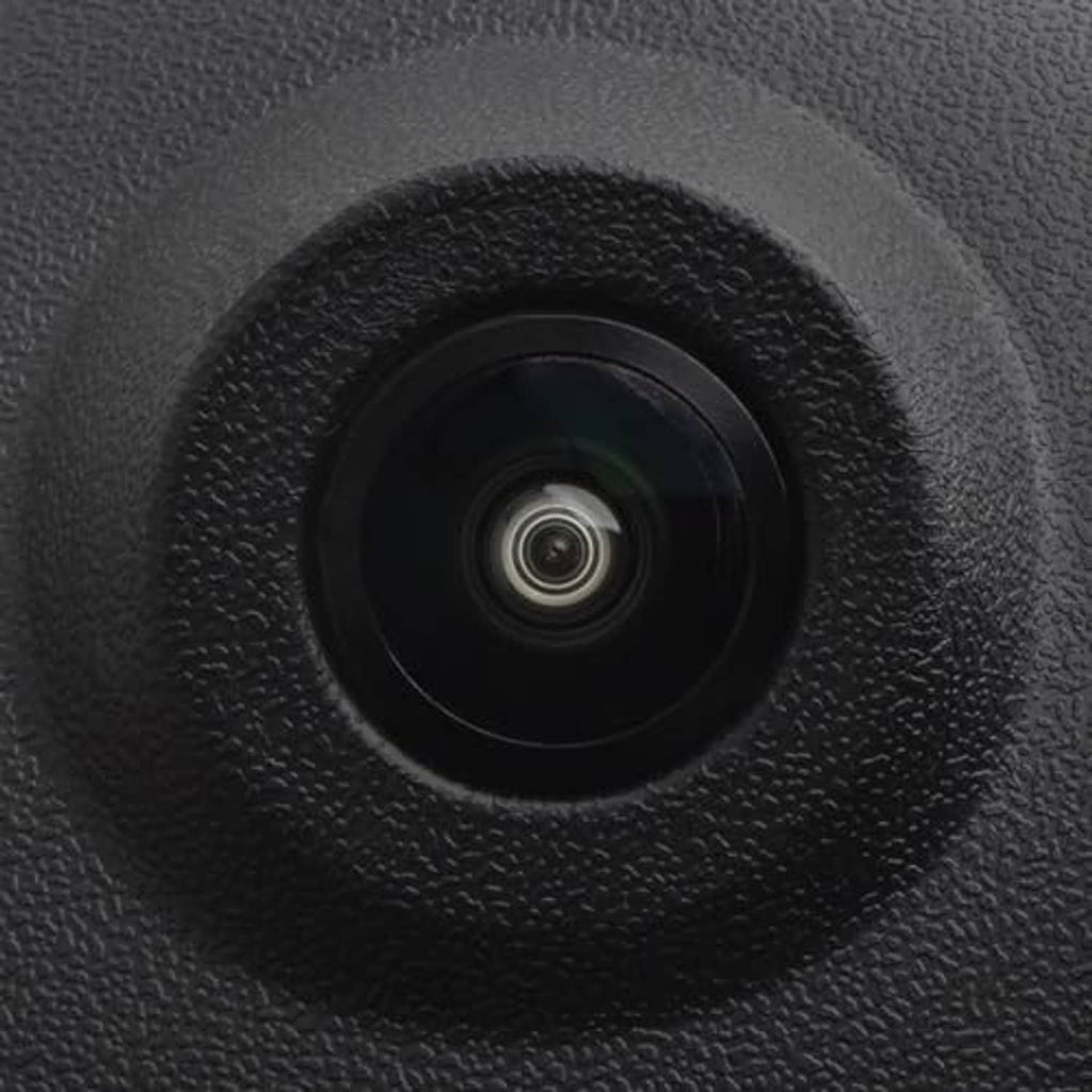 Close-up of backup camera lens in black textured housing