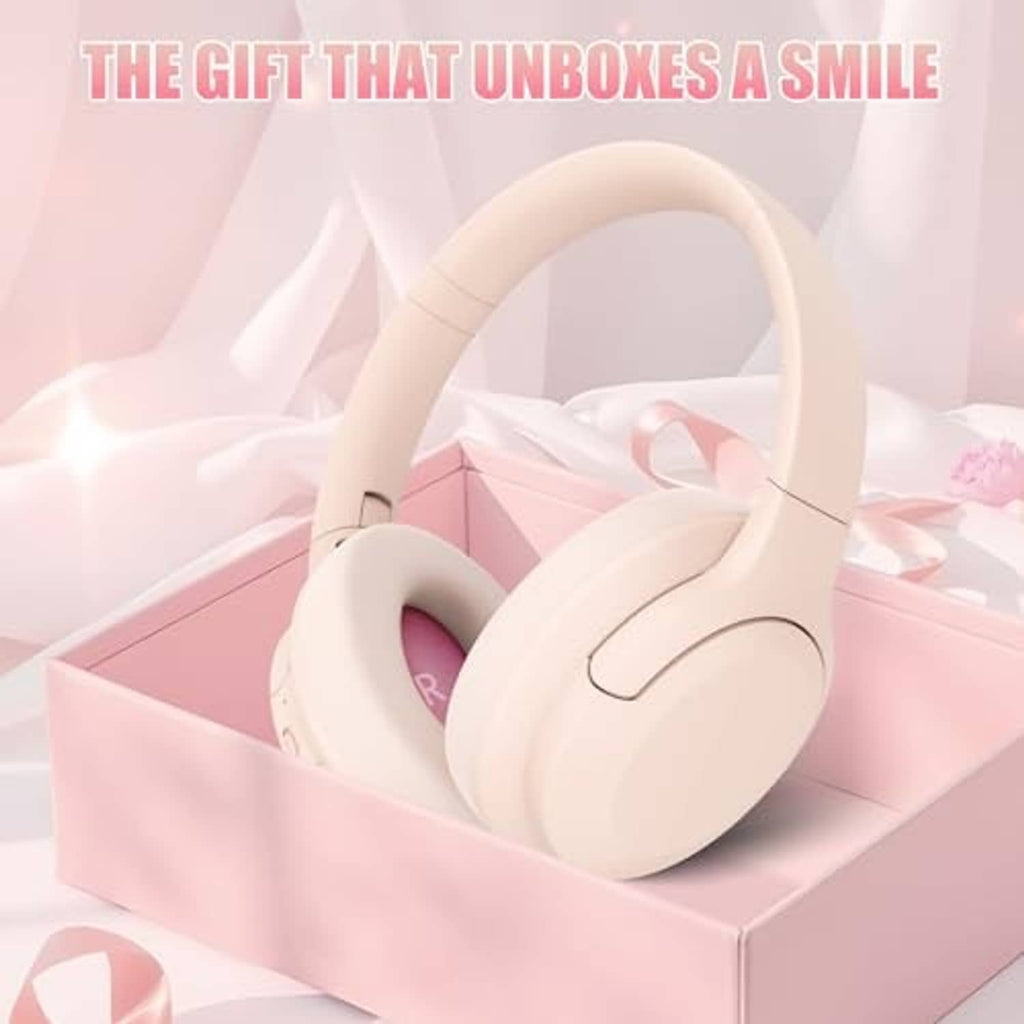 Light pink over-ear wireless headphones resting on a gift box with padded earcups