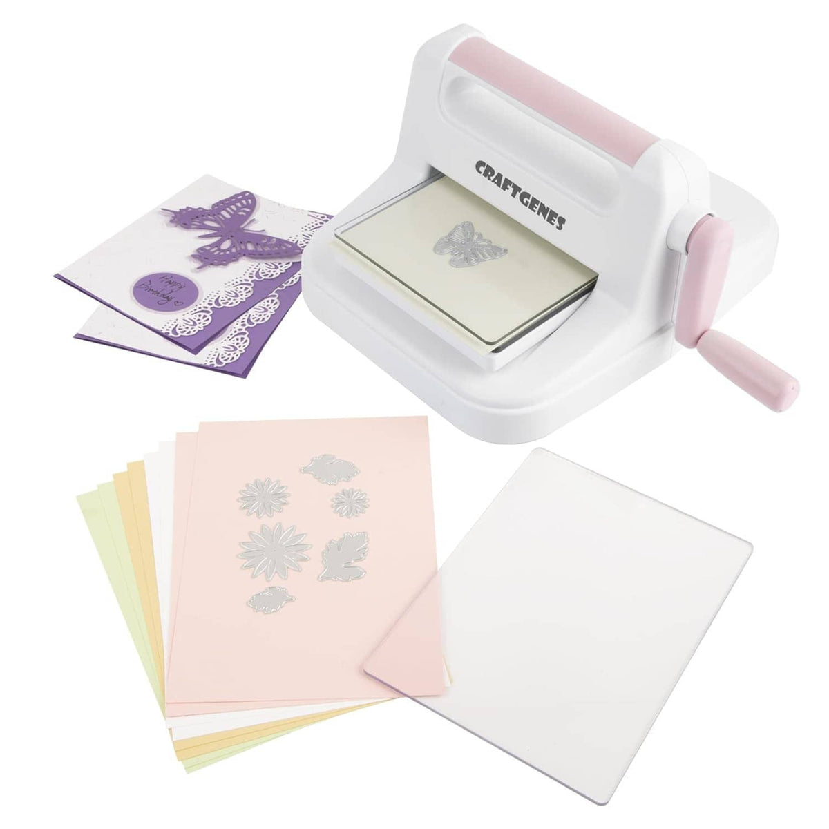 Die cutting and embossing machine with sample cards and cut shapes, white and pink, CRAFTGENES