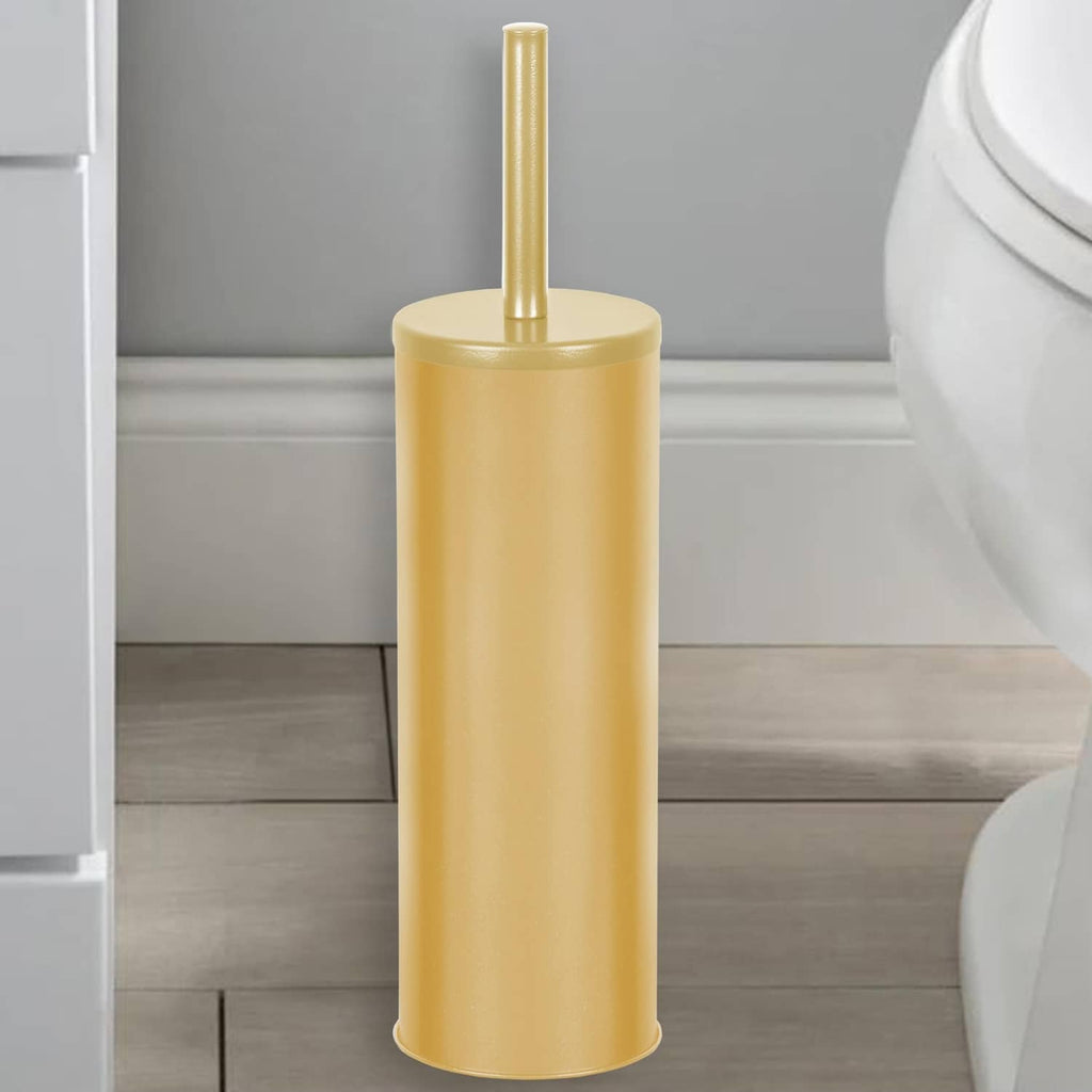 Gold toilet plunger with black rubber cup in tall gold holder, beside toilet