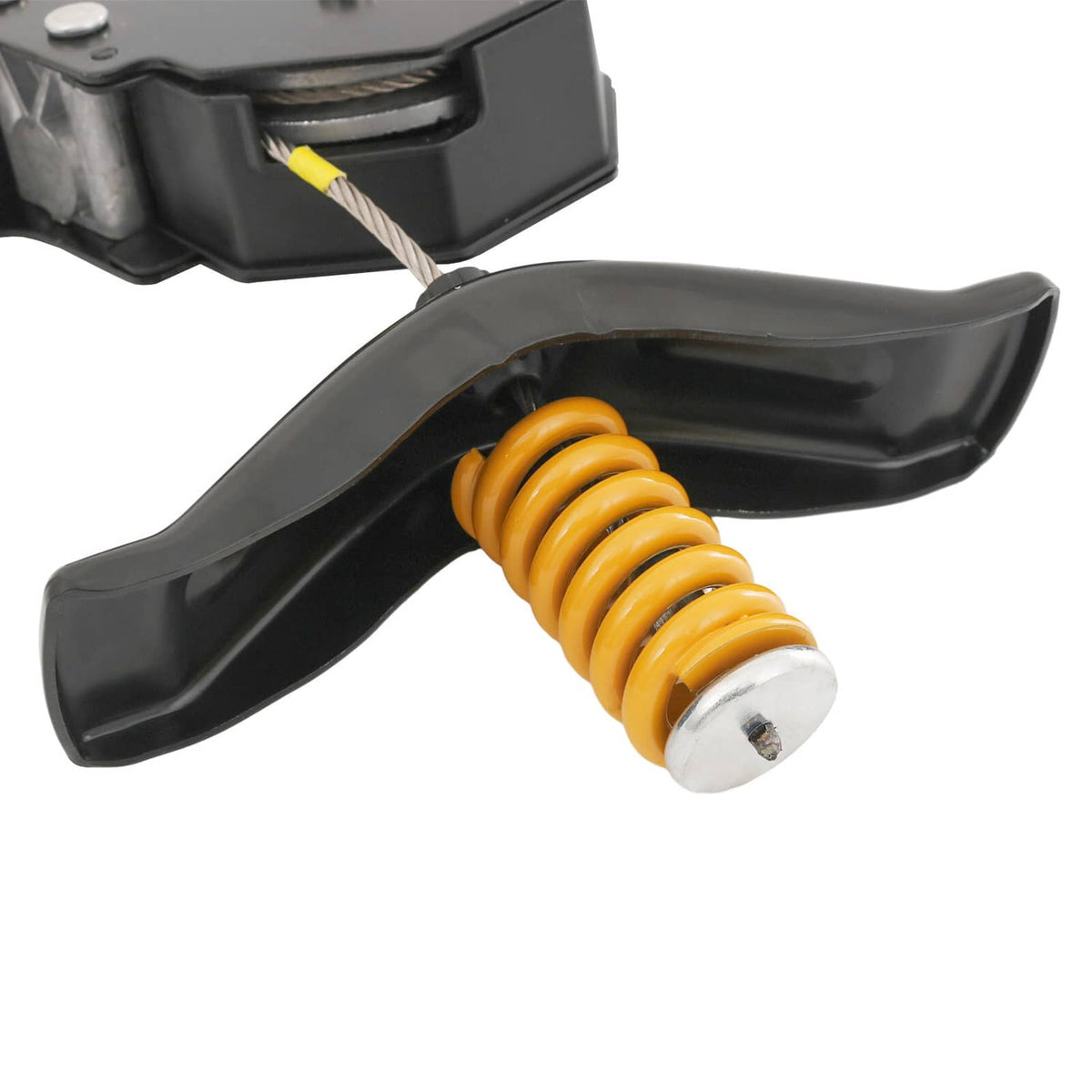 Close-up of black spare tire winch lever with orange coil spring and bolt